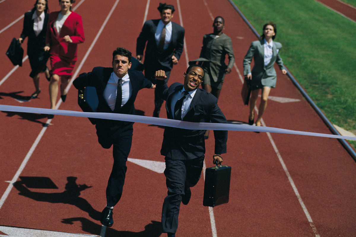 Sales Professionals Running Through A Finish Line - The Kern Group Ontario Sales Leaders